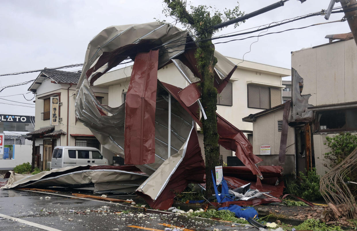 An object blown by strong winds is stranded on a power line in Miyazaki, Japan, on Thursday.