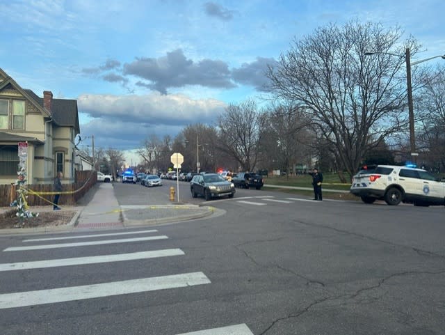 Police tape marks the scene of a shooting near 29th Avenue and Gilpin Street in Denver on March 30, 2024.