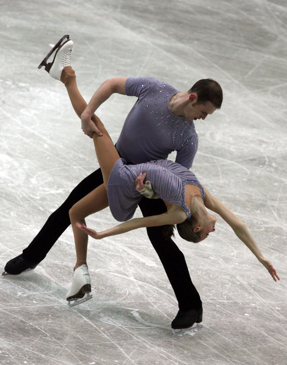 FILE - In this Dec. 8, 2006, file photo, Bridget Namiotka and John Coughlin perform during the ISU Junior Grand Prix of Figure Skating Final in Sofia, Bulgaria. One of the former skating partners of two-time U.S. pairs champion John Coughlin has accused him in a series of social media posts of sexually assaulting her over a 2-year period. Bridget Namiotka said on Facebook that Coughlin, who died by suicide in January, hurt "at least 10 people including me." She skated with Coughlin from 2004, when she was 14, through the 2007 season. Namiotka's attorney confirmed to The Associated Press that the comments were made by her. (AP Photo/File)