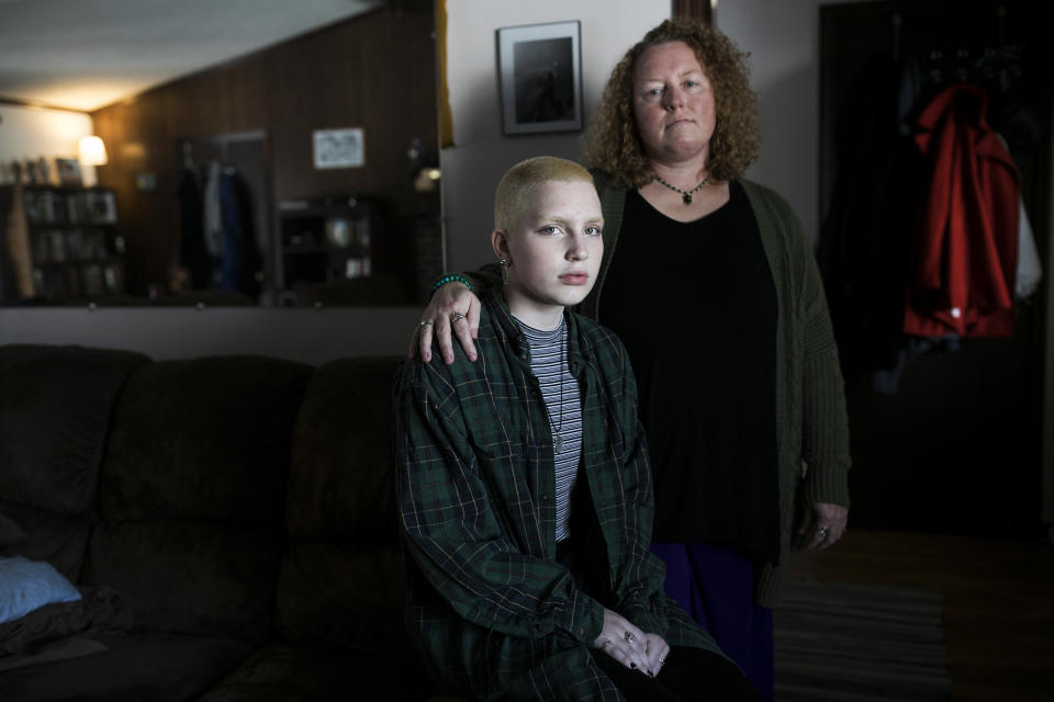 Aidyn Sucec and his mother, Laura Sucec, sit in their home in Brownsburg, Indiana on Nov. 11, 2019. | Maddie McGarvey for TIME