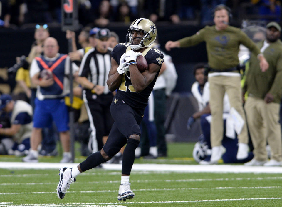 New Orleans Saints wide receiver Michael Thomas (13) pulls in a 72 yard touchdown reception in the second half of an NFL football game against the Los Angeles Rams in New Orleans, Sunday, Nov. 4, 2018. (AP Photo/Bill Feig)