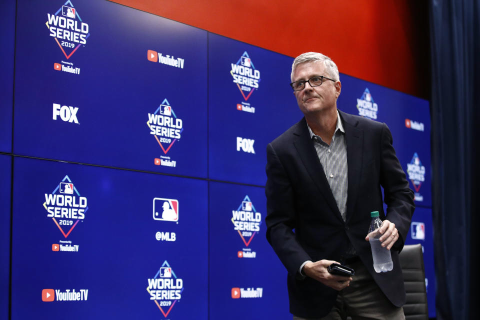 Houston Astros general manager Jeff Luhnow departs after speaking during a news conference Thursday, Oct. 24, 2019, in Washington. The Astros and the Washington Nationals are scheduled to play Game 3 of baseball's World Series on Friday. (AP Photo/Patrick Semansky)