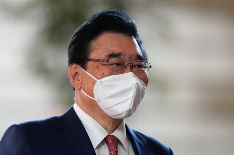 Japan's new Minister of Health, Labour and Welfare Shigeyuki Goto arrives at prime minister's office in Tokyo