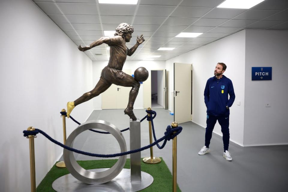 Southgate admires a statue of Diego Maradona in Naples (The FA via Getty Images)