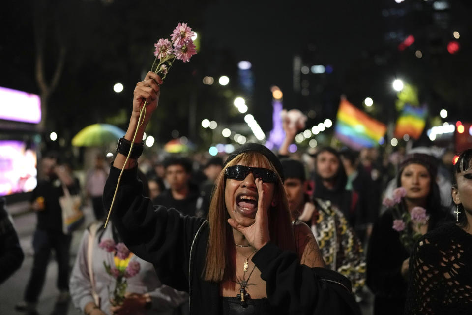 A demonstrator shouts during a protest in Mexico City, Monday, Nov. 13, 2023. The first openly nonbinary person to assume a judicial position in Mexico was found dead in their home Monday in the central Mexican city of Aguascalientes after receiving death threats because of their gender identity, authorities said. (AP Photo/Eduardo Verdugo)