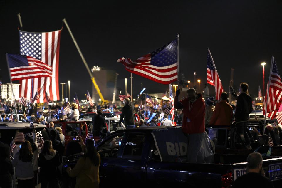 Supporters of President-elect Joe Biden wait at the Chase Center.