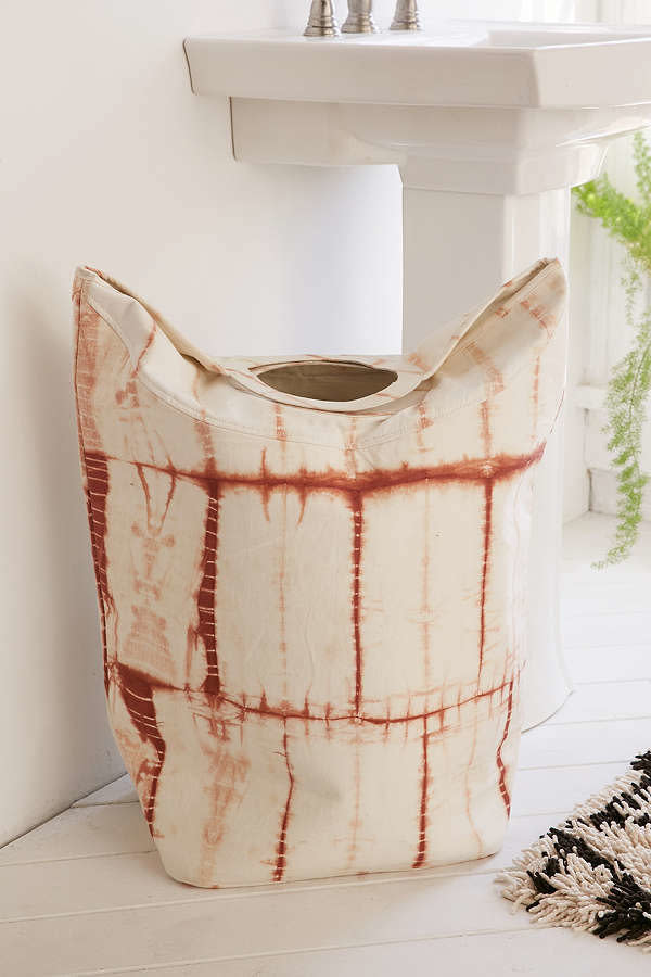 Get it <a href="https://www.urbanoutfitters.com/shop/peach-shibori-hamper" target="_blank">here</a>.