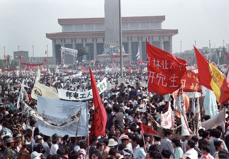 FILE PHOTO: Hundreds of thousands of people fill Beijing's central Tiananmen Square, China, May 17, 1989 in front of the Monument to the People's Heroes and Mao's mausoleum. REUTERS/Ed Nachtrieb/File Photo
