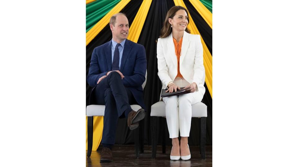 Prince William and Kate Middleton sat in front of the Jamaican flag