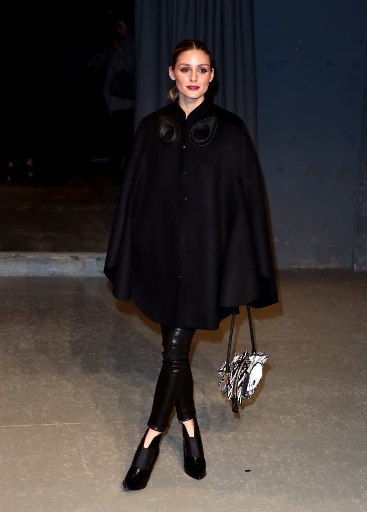 Olivia Palermo arrived wearing the military wool cape from the brand’s AW17 collection. [Photo: PA}