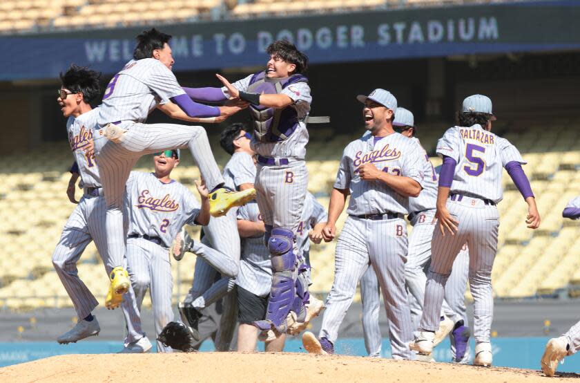 LOS ANGELES, CALIFORNIA May 25, 2024- Bell celebrates after defeating Birmingham in the City Section Open Division championship at Dodger Stadium Saturday. (Wally Skalij/Los Angeles Times)