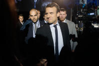 <p>French independent centrist presidential candidate Emmanuel Macron arrives for an election campaign rally in Arras, northern France, Wednesday, April 26, 2017. Battling for France’s blue-collar vote and employing all of her political guile, far-right presidential candidate Marine Le Pen upstaged her centrist rival Macron by making a surprise campaign stop Wednesday to a home appliance factory threatened with closure. (AP Photo/Thibault Camus) </p>