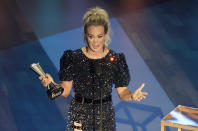 Carrie Underwood accepts the entertainer of the year award in a tie with Thomas Rhett during the 55th annual Academy of Country Music Awards at the Grand Ole Opry House on Wednesday, Sept. 16, 2020, in Nashville, Tenn. (AP Photo/Mark Humphrey)