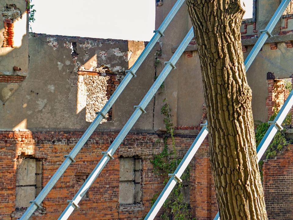 Bannerman Castle's remaining tower wall and a warehouse wall.