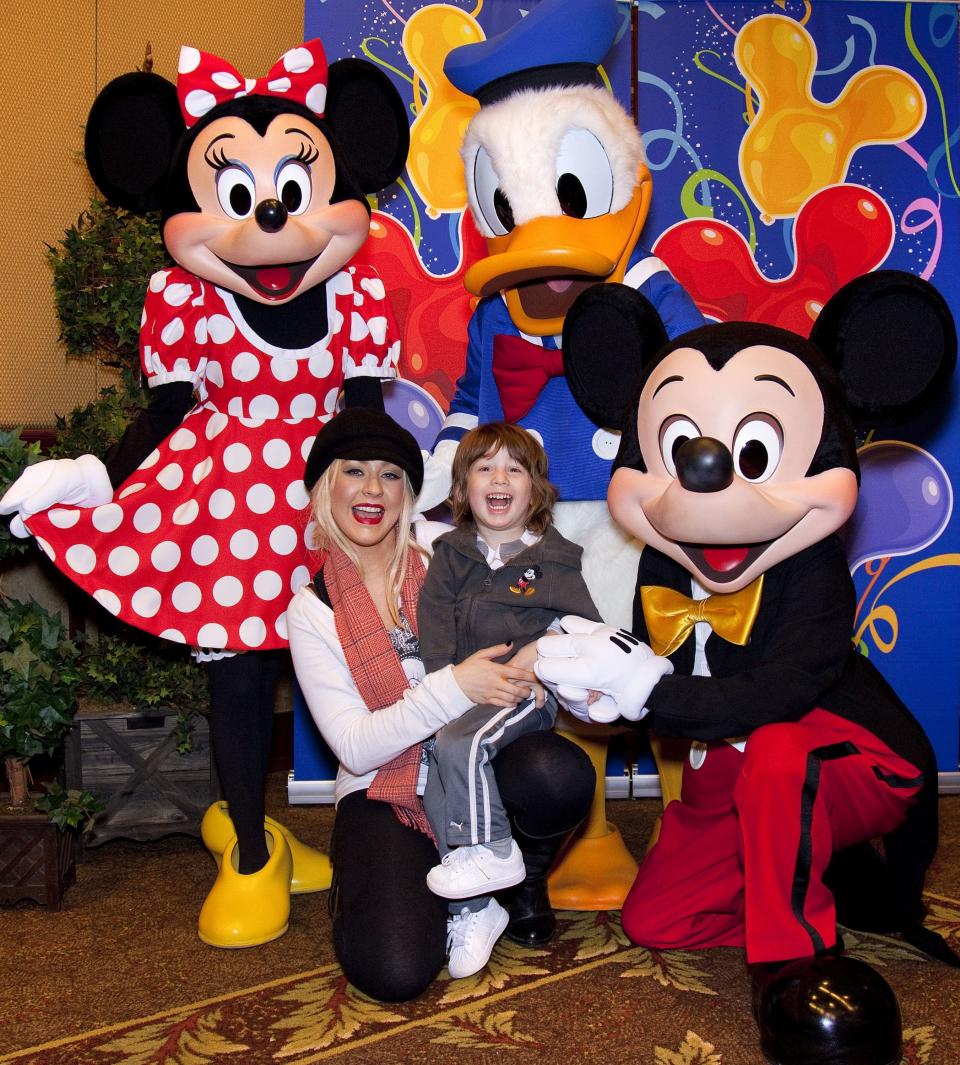 Aguilera with Max in 2010 at Disneyland&nbsp;in Anaheim, California. (Photo: Handout via Getty Images)