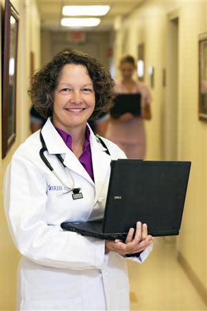 Dr. Pamela Banister poses while working at a clinic which is part of the Singing River Health System in Pascagoula, Mississippi September 26, 2013. REUTERS/Lyle Ratliff