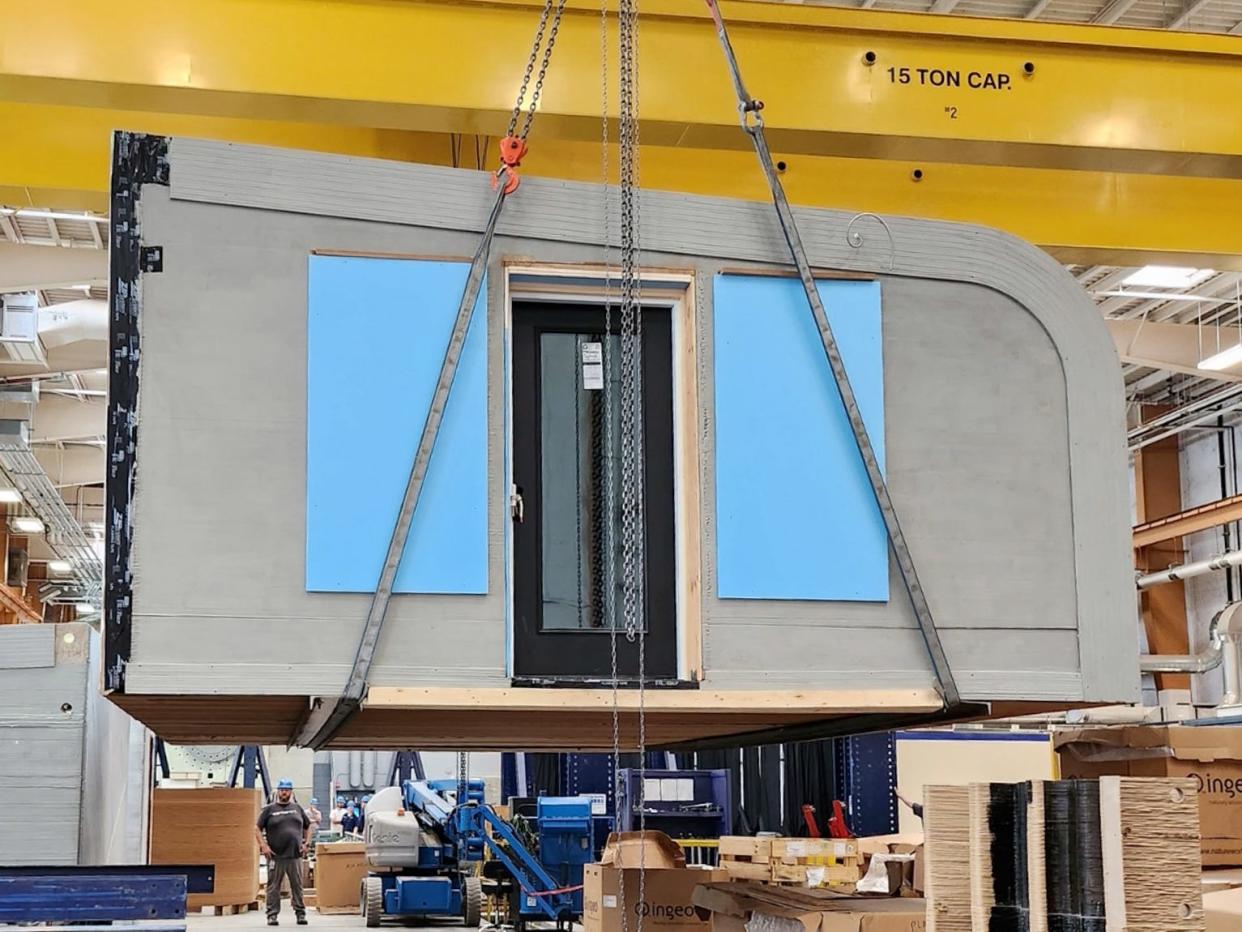 A module of University of Maine Advanced Structures and Composites Center's 3D printed tiny home being moved