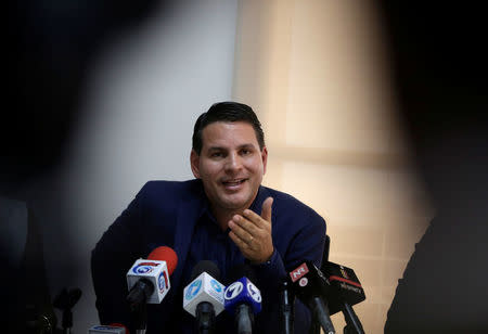 Defeated presidential candidate Fabricio Alvarado Munoz speaks to the media in San Jose, Costa Rica April 2, 2018. REUTERS/Juan Carlos Ulate