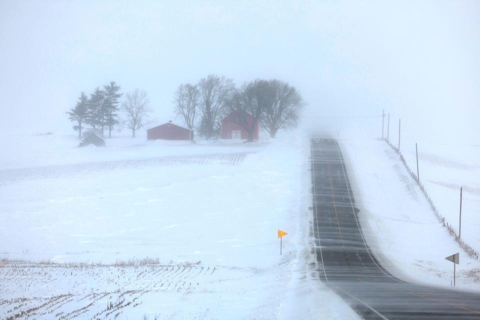 DES MOINES, IOWA - JANUARY 13: Snow is blown across a road as a snowy and freezing cold weather system passes through the area on January 13, 2024, in Des Moines, Iowa. The weather system is bringing snowfall and subzero temperatures to Iowa as voters prepare for the Republican Party of Iowa's presidential caucuses on January 15th. (Photo by Joe Raedle/Getty Images) ORG XMIT: 776087552 ORIG FILE ID: 1930499390