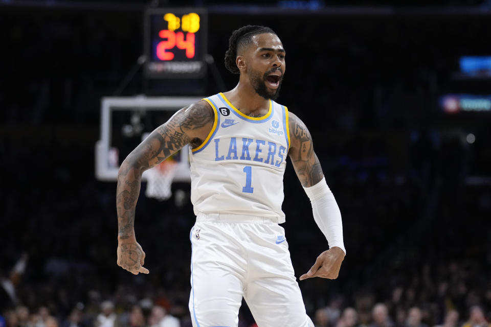 Los Angeles Lakers guard D'Angelo Russell (1) celebrates after scoring against the New York Knicks during the first half of an NBA basketball game Sunday, March 12, 2023, in Los Angeles. (AP Photo/Marcio Jose Sanchez)