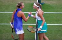 Tennis - WTA Premier - Aegon Classic - Edgbaston Priory Club, Birmingham, Britain - June 23, 2017 Czech Republic's Petra Kvitova shakes the hand of France's Kristina Mladenovic as she celebrates winning her quarter final match Action Images via Reuters/Peter Cziborra