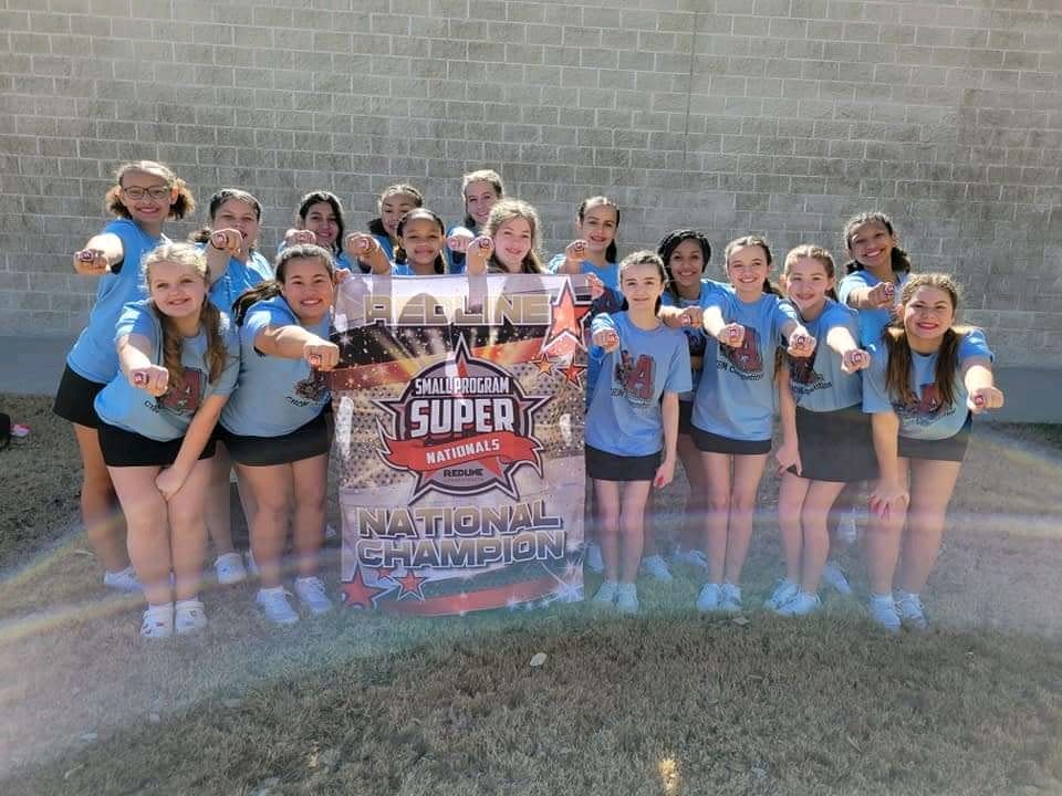 AMS students named national champions at Redline cheer/dance/pom competition.