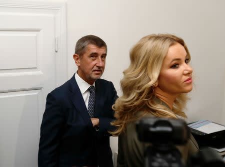 The leader of ANO party Andrej Babis and his wife Monika arrive to cast their vote in parliamentary elections in Prague, Czech Republic October 20, 2017. REUTERS/David W Cerny