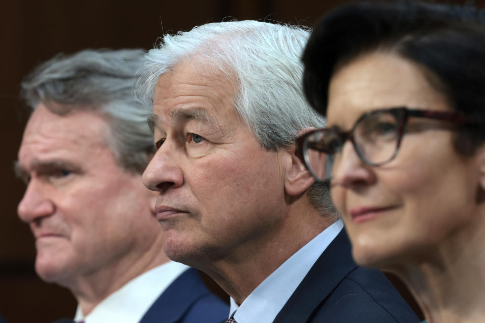 WASHINGTON, DC – DECEMBER 6: (L-R) Brian Moynihan, Chairman and CEO of Bank of America;  Jamie Dimon, chairman and CEO of JPMorgan Chase;  and Jane Fraser, CEO of Citigroup;  Testify during a Senate Banking Committee hearing in the Hart Senate Office Building on December 6, 2023 in Washington, DC.  The committee heard testimony from the largest financial institutions during an oversight hearing on Wall Street firms.  (Photo by Win McNamee/Getty Images)