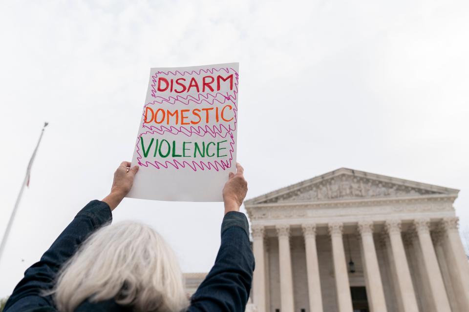 Gun safety and domestic violence prevention organizations gather outside of the Supreme Court before oral arguments are heard in United States v. Rahimi on Tuesday, Nov. 7. in Washington. Arizona was among two dozen states that filed a brief urging the justices to take the case and uphold the federal domestic violence-related gun restriction.