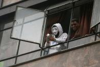 Demonstrators take part in a protest as a national strike continues in Bogota