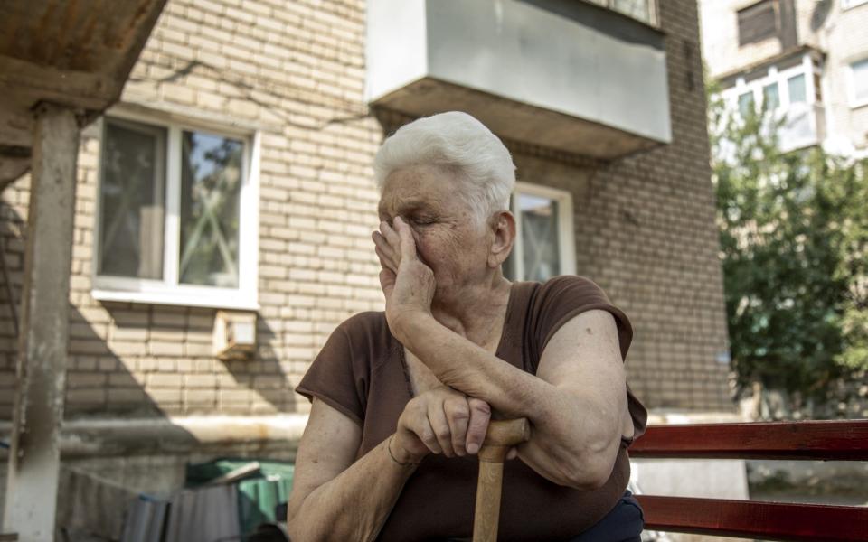 An elder woman cries as she narrates living in fear during heavy shelling in Siversk, Ukraine - Narciso Contreras/Anadolu Agency via Getty Images