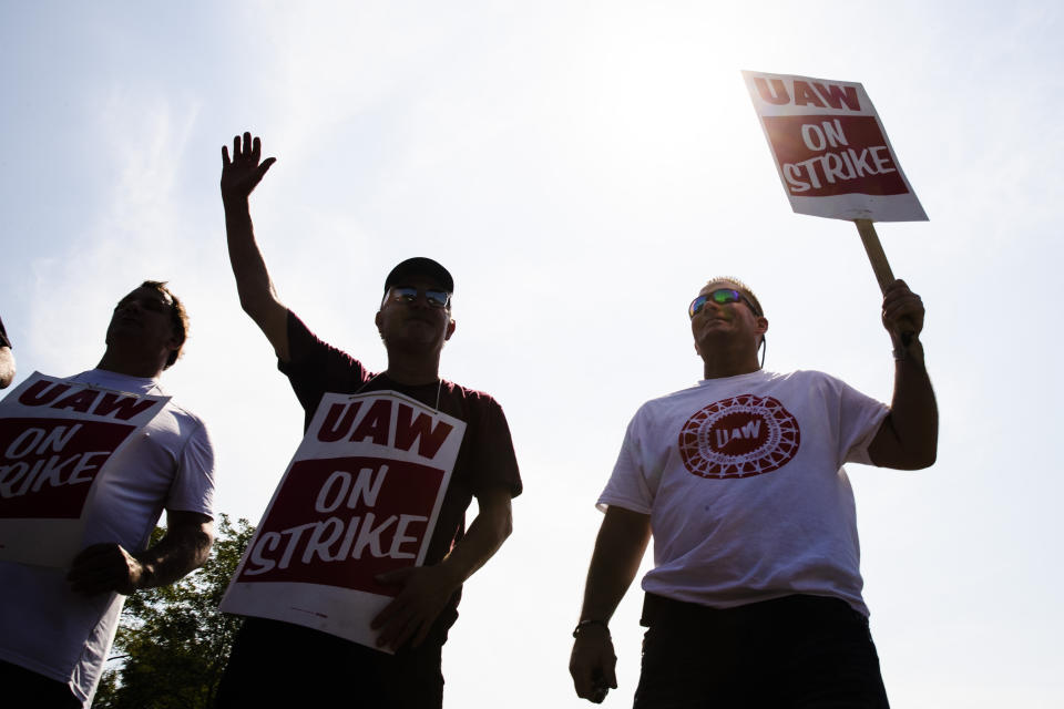 Workers picket outside a General Motors facility in Langhorne, Pa., Monday, Sept. 23, 2019. The strike against General Motors by 49,000 United Auto Workers entered its second week Monday with progress reported in negotiations but no clear end in sight. (AP Photo/Matt Rourke)