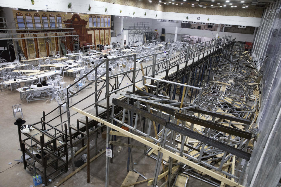 An empty synagogue is seen in Givat Zeev, outside Jerusalem, Sunday, May 16, 2021. Israeli medics say more than 150 people were injured in a fatal collapse of a bleacher at an uncompleted West Bank synagogue. (AP Photo/Sebastian Scheiner)