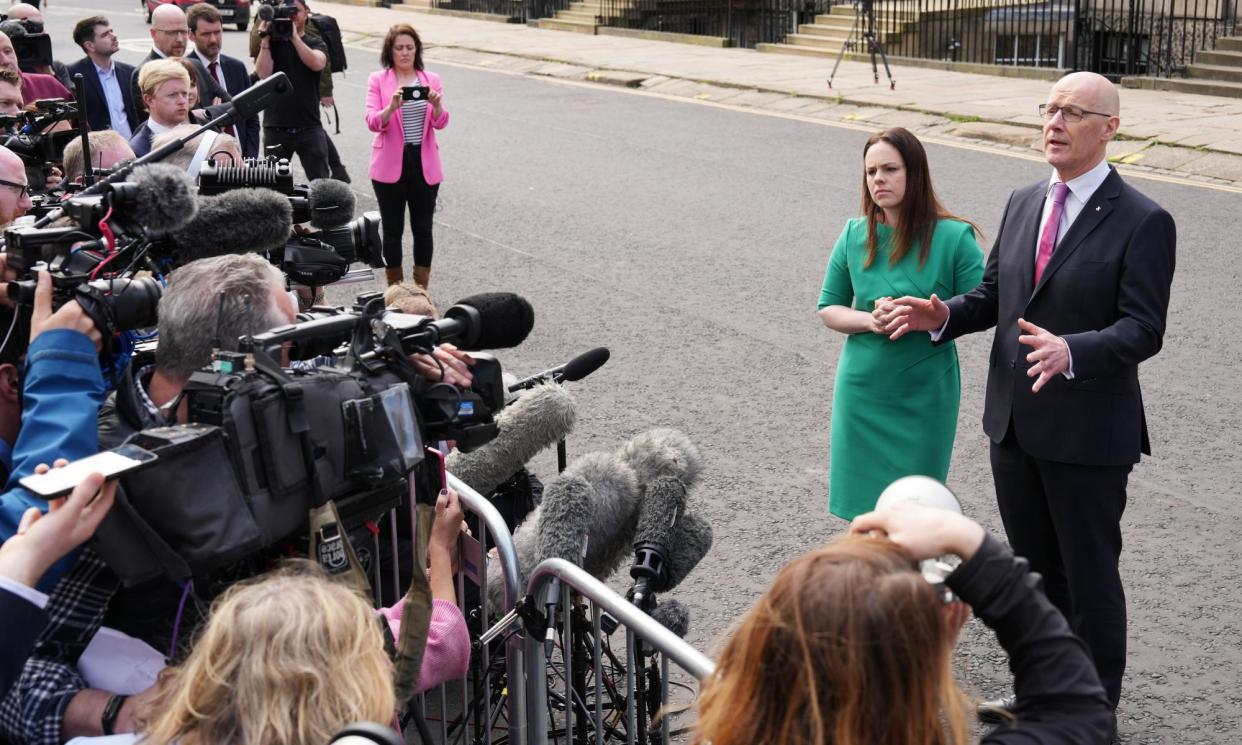 <span>John Swinney and his deputy first minister, Kate Forbes, address the media in Edinburgh on Thursday after his mini cabinet reshuffle.</span><span>Photograph: Stuart Wallace/Rex/Shutterstock</span>