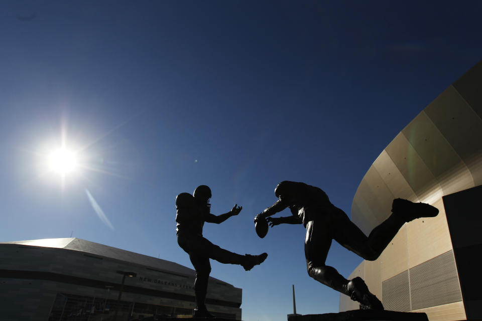 A bronze statue titled “Rebirth,” outside the Mercedes-Benz Superdome, depicts former New Orleans Saint Steve Gleason blocking a punt against the Atlanta Falcons during the first “Monday Night Football” game, after the Superdome re-opened following Hurricane Katrina. (AP)