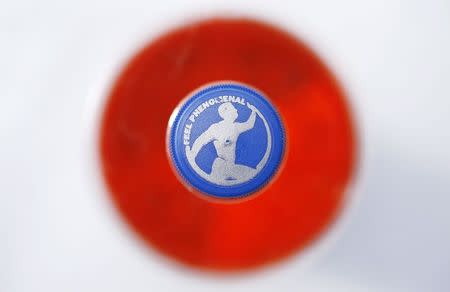 A bottle of Irn-Bru is seen in Edinburgh, Scotland in this May 2, 2014 file photo. Irn-Bru has been manufactured since 1901, the manufacturer, A. G. Barr, describes the soda as "Scotland's other national drink." REUTERS/Suzanne Plunkett/Files