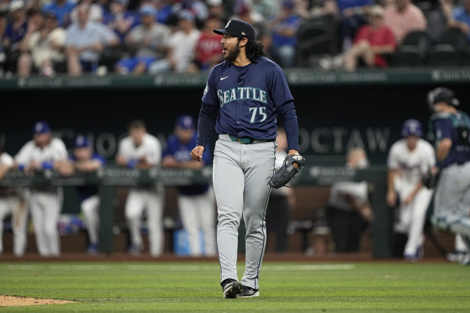 Seattle Mariners relief pitcher Andres Munoz celebrates after the team's 4-3 win in a baseball game against the Texas Rangers in Arlington, Texas, Thursday, April 25, 2024. (AP Photo/Tony Gutierrez)