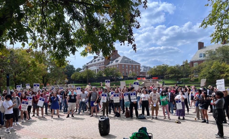 Graduate student employees and their allies for collective bargaining rights stand during a rally at the University of Maryland, College Park on Thursday, September 21, 2023.