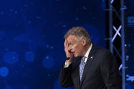 Virginia Democratic gubernatorial candidate and former Gov. Terry McAuliffe participates with his Republican challenger, Glenn Youngkin, in a debate at Northern Virginia Community College, in Alexandria, Va., Tuesday, Sept. 28, 2021. (AP Photo/Cliff Owen)