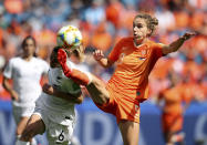 Netherlands' Vivianne Miedemam, right, kicks the ball challenged by New Zealand's Rebekah Stott during the Women's World Cup Group E soccer match between New Zealand and the Netherlands in Le Havre, France, Tuesday, June 11, 2019. (AP Photo/Francisco Seco)