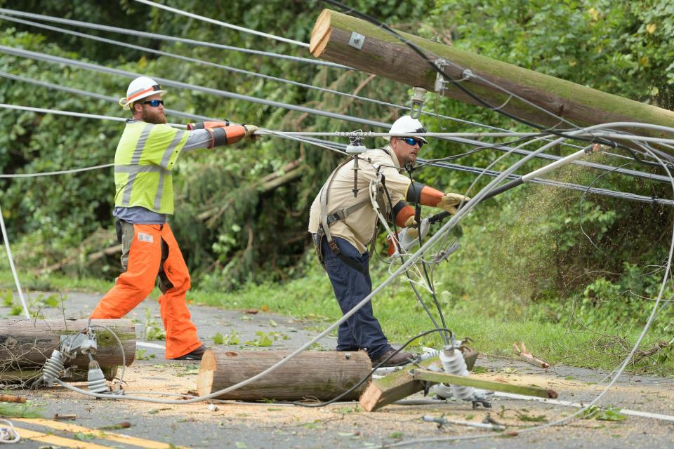 Work crew begin clearing and repairing damage from an August 2020 storm.