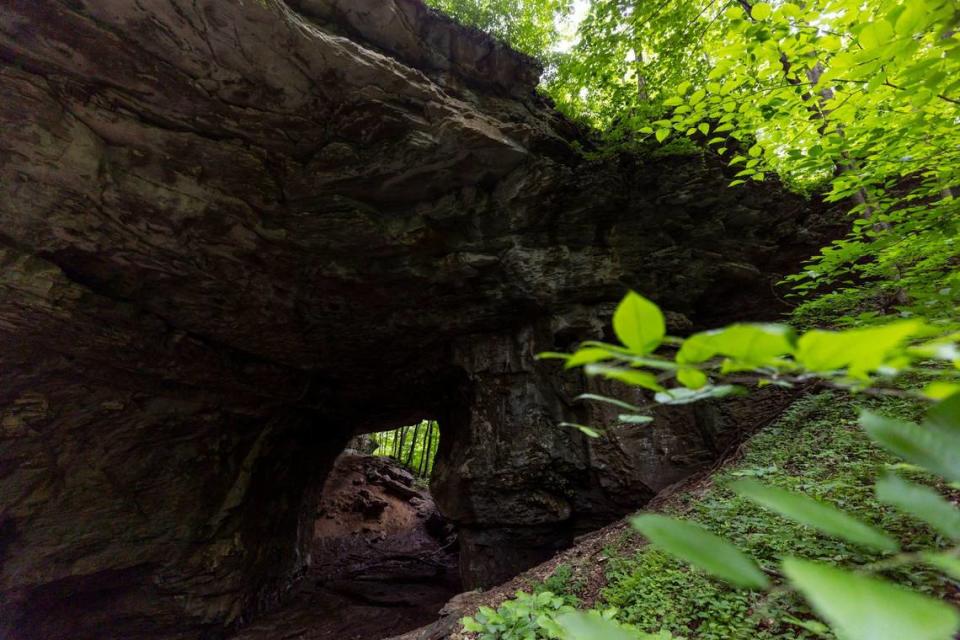 Smokey Bridge is photographed at Carter Caves State Resort Park in Carter County. Carter Caves, about a 1.5-hour drive from Lexington, offers a lodge and cottages; campground; restaurant; cave tours; hiking; disc golf course; fishing; swimming and rock climbing areas.