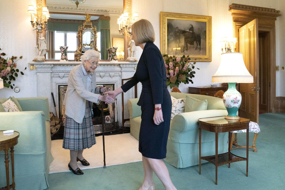 TOPSHOT - Britain's Queen Elizabeth II and new Conservative Party leader and Britain's Prime Minister-elect Liz Truss meet at Balmoral Castle in Ballater, Scotland, on September 6, 2022, where the Queen invited Truss to form a Government. - Truss will formally take office Tuesday, after her predecessor Boris Johnson tendered his resignation to Queen Elizabeth II. (Photo by Jane Barlow / POOL / AFP) (Photo by JANE BARLOW/POOL/AFP via Getty Images)