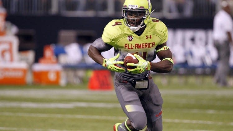 Tim Brewster was responsible for helping persuade five-star Miami-Central running back Dalvin Cook, shown in the Under Armour All-America football game on Jan. 2, 2014, to switch his commitment from Florida to Florida State.