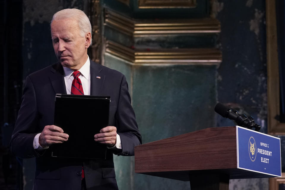 President-elect Joe Biden leaves after speaking at an event at The Queen theater, Friday, Jan. 15, 2021, in Wilmington, Del. (AP Photo/Matt Slocum)