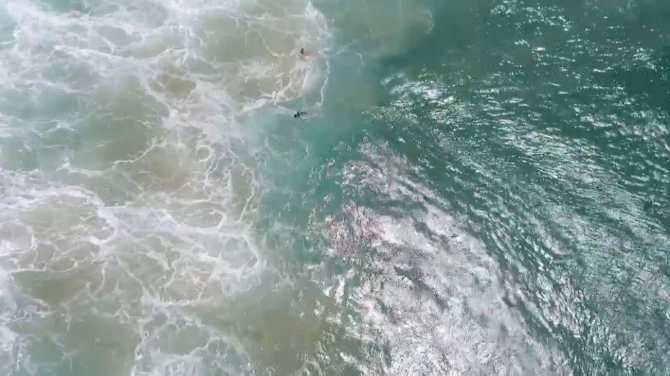 The drone pinpoints the location of the struggling swimmers. Source: SLSNSW/Little Ripper Group/NSW DPI