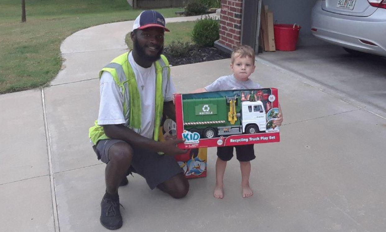 Aaron Mitchell, with American Waste Control, surprised a young fan in Jenks, Oklahoma with his very own recycling truck. (Photo: Facebook)