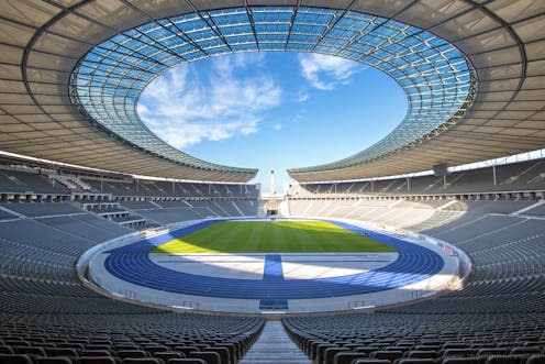 <span class="caption">The Olympiastadion in Berlin.</span> <span class="attribution"><a class="link " href="https://en.wikipedia.org/wiki/Olympiastadion_(Berlin)#/media/File:Olympiastadion_Berlin_Sep-2015.jpg" rel="nofollow noopener" target="_blank" data-ylk="slk:Martijn Mureau/Wikimedia;elm:context_link;itc:0;sec:content-canvas">Martijn Mureau/Wikimedia</a>, <a class="link " href="http://creativecommons.org/licenses/by-sa/4.0/" rel="nofollow noopener" target="_blank" data-ylk="slk:CC BY-SA;elm:context_link;itc:0;sec:content-canvas">CC BY-SA</a></span>