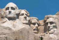 <p><strong>Mount Rushmore </strong></p><p><a href="https://www.nps.gov/moru/index.htm" rel="nofollow noopener" target="_blank" data-ylk="slk:Mount Rushmore National Memorial;elm:context_link;itc:0;sec:content-canvas" class="link ">Mount Rushmore National Memorial</a> in Keystone, South Dakota, should be on everyone’s bucket list. Featuring 60 foot tall heads of our Presidents George Washington, Thomas Jefferson, Theodore Roosevelt, and Abraham Lincoln, it’s a sight you need to see at least once in your lifetime.</p>