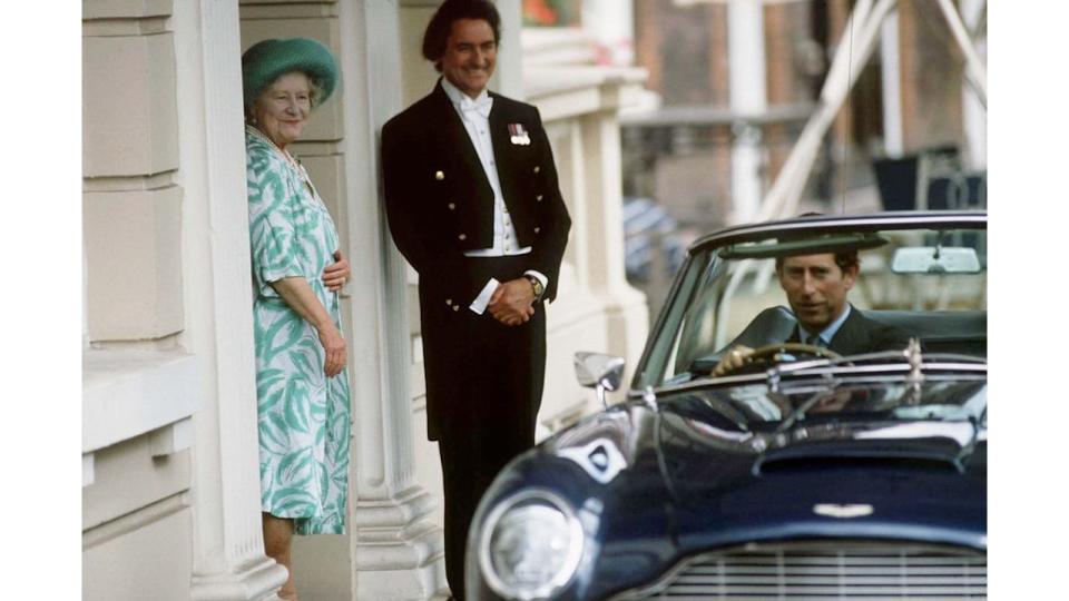 The Queen Mother and William Tallon as King Charles leaves in a car